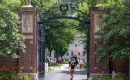 People walk through the gate on Harvard Yard at the Harvard University campus on June 29, 2023 in Cambridge, Massachusetts. (Photo by Scott Eisen/Getty Images)
