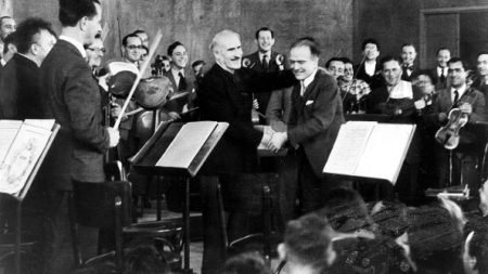 The Italian-Jewish conductor Arturo Toscanini thanks Bronislaw Huberman, the founder of the Palestine Symphony Orchestra, at the opening concert in Tel Aviv in 1936. Huberman, who foresaw the Holocaust, persuaded 75 Jewish musicians from major European orchestras to immigrate to Palestine, creating what he called the “materialization of the Zionist culture in the fatherland.” (Photo by Abraham Pisarek via Getty Images)