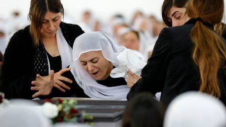 An Israeli Druze woman mourns at the funeral of 17-year-old Tiran Fero, in Daliyat al Karmel, Israel, on November 24, 2022. (Photo by Jalaa Marey/AFP via Getty Images)
